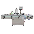 Automatic positioning labeling machine for round bottles